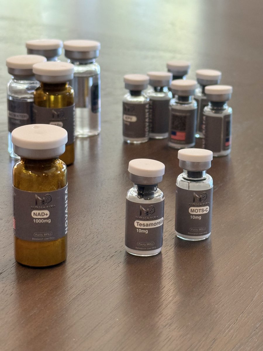Novanta Research NAD+, Tesamorelin and MOTS-C vials arranged on a table